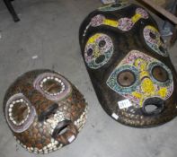 2 West African face masks.