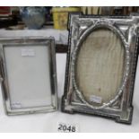 2 hall marked silver photograph frames, B & Co., Birmingham 1912 and G & C Ltd, Birmingham 1919.