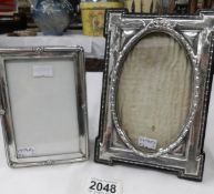 2 hall marked silver photograph frames, B & Co., Birmingham 1912 and G & C Ltd, Birmingham 1919.