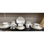 A Limoges France tea set plus egg cups, milk, sugar,