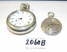 A ladies silver fob watch and a gent's nickel pocket watch.