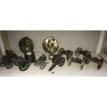 A collection of brass cannons, brass plaques of Napoleon and Wellington, pewter ink well etc.