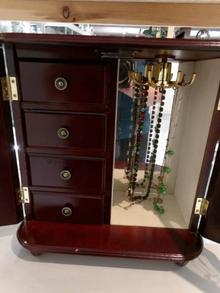 A jewellery cabinet and necklaces. - Image 2 of 2