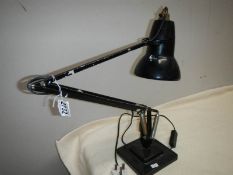 A vintage angle poise lamp.