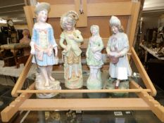 4 continental bisque porcelain figures.