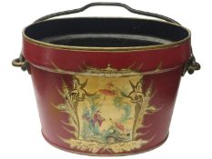 An old red painted bucket with oriental scene.