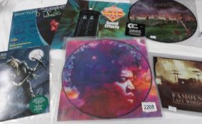 A Megadeth 'Back to Black' picture disc, a Jimi Hendrix picture disc,