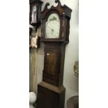 An oak cased 30 hour Grandfather clock.