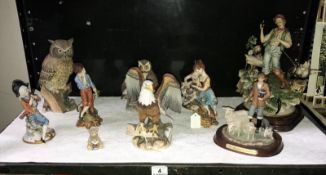 A shelf of figures including Capodimonte, Meridian etc.