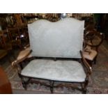 A 2 seater high back setter with mahogany frame.
