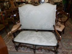 A 2 seater high back setter with mahogany frame.