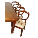 A set of 8 Victorian mahogany dining chairs on turned legs.