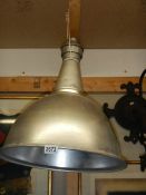 A vintage metal industrial lamp shade.
