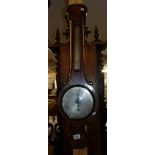 A banjo barometer with mercury thermometer by I. T. Briggs of Spalding.