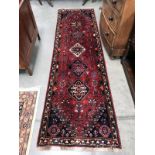 A Persian carpet/runner