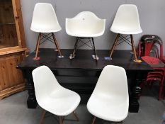 4 Eames plastic chairs and 1 rocker by Charles & Ray Eames No.