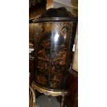 A Japanese lacquered corner cupboard.