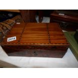 An inlaid work box.