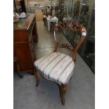 A Victorian mahogany cabriole leg dining chair.