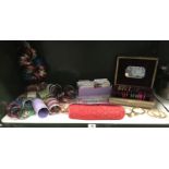 A shelf of decorative bangles and a quantity of face jewellery by Sweetgirl, Sitara etc.