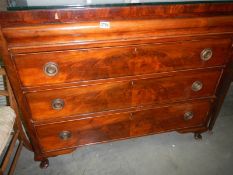 A mahogany chest with narrow top drawer and 3 deeper drawers.