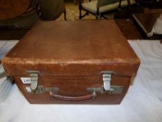 A 1920's Gentleman's compactum Vanity case (some contents missing or a/f).