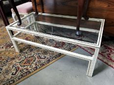 A bevel glass top coffee table