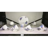 A 6 piece setting Royal Vale tea set - 6 cups, saucers, sides, cake,