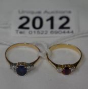 2 gold rings - on set with sapphires and diamonds (hall mark worn) the other set with ruby and