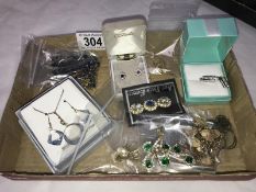 A quantity of costume jewellery including earrings, pendants and brooches etc.