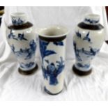 A pair of oriental blue and white vases ( 1 a/f) and another blue and white vase (a/f) all with