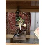 A Bretby figure of Sam Weller converted in to a lamp.