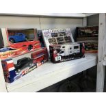 A quantity of boxed Diecast cars including Burago,