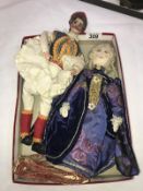 2 vintage costume dolls