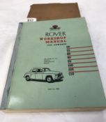 An old Rover 100 manual in original box