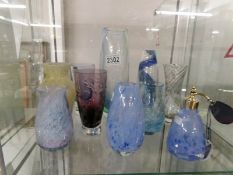9 boxed Caithness glass vases and an atomiser.