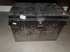 An old tin trunk.