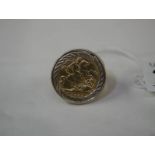 An 1896 half sovereign set in a 9ct gold ring (approximate total weight 10 grams).