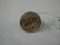 An 1896 half sovereign set in a 9ct gold ring (approximate total weight 10 grams).