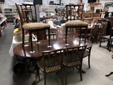 An extending dining table and 6 chairs