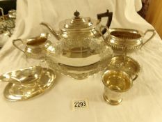 A silver plate tea set and other silver plate.