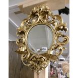 A 19th century Florentine giltwood 'Girondell' mirror.