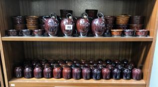 A large quantity of Grayshott pottery table ware