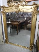 A large 18th century giltwood over mantel mirror, approximately 166 x 133 cm.