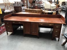 A 1930's oak side-by-side partners desk