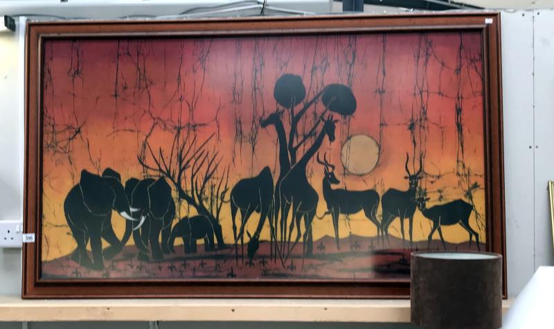 A large framed African scene of animals by R.