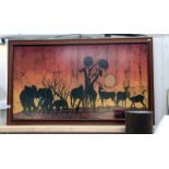 A large framed African scene of animals by R.