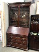 A Victorian mahogany astragal glazed bureau/bookcase