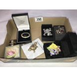 A collection of costume jewellery including rings and brooches