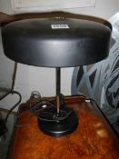 A 1950's Phillip's black and chrome table lamp.